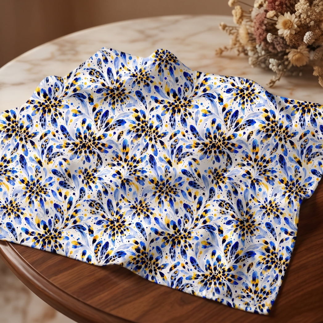 Blue and yellow watercolor floral pattern on fabric