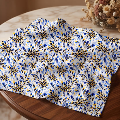 Blue and yellow watercolor floral pattern on fabric