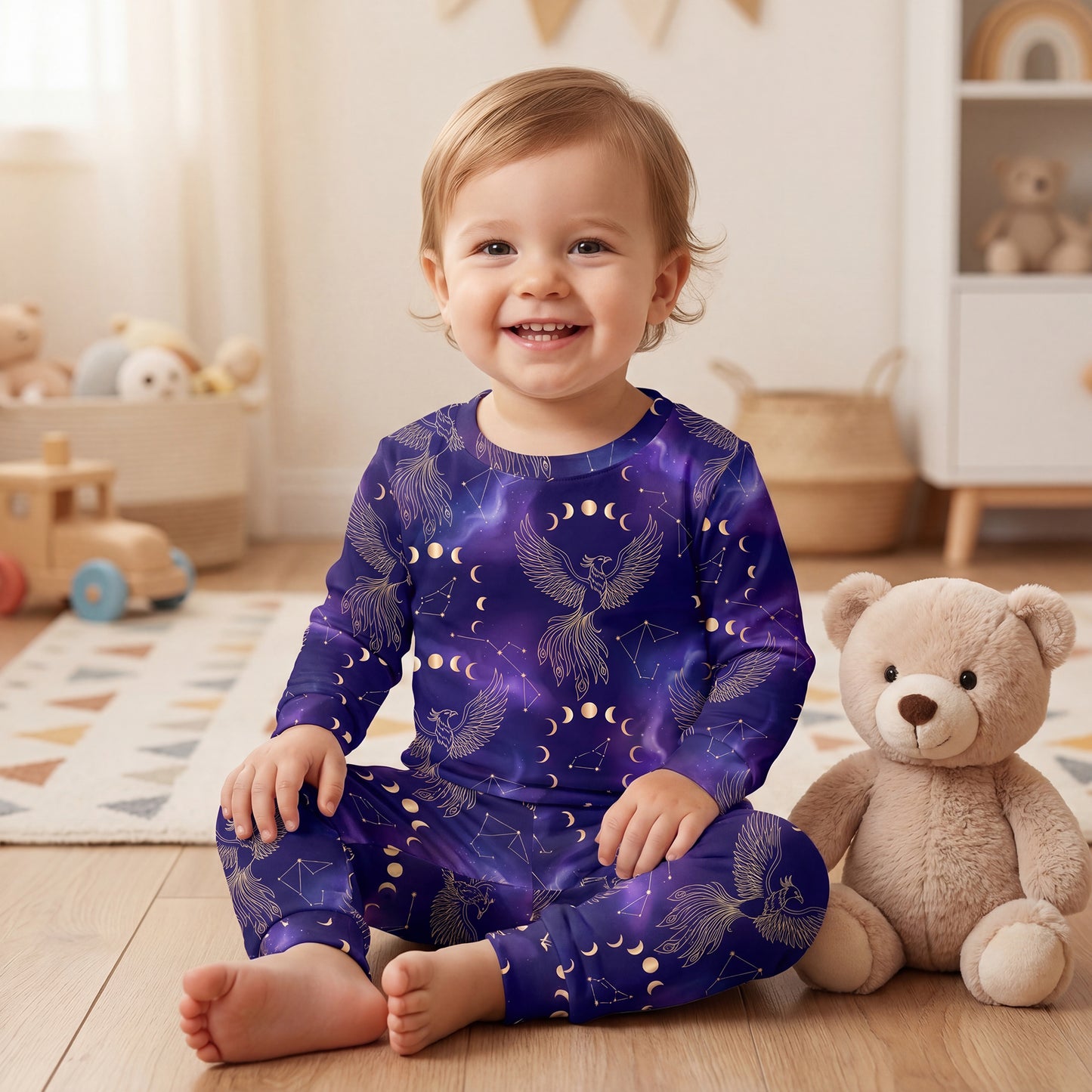 Mockup of baby pajamas showing how the celestial golden phoenix seamless pattern looks printed on clothing.