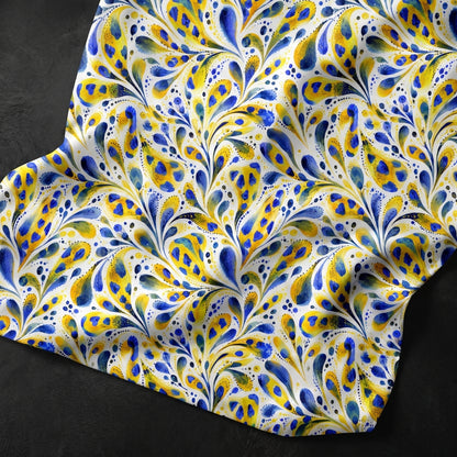 Azure and gold one-of-a-kind watercolor botanical pattern with expressive blue and yellow leaves on a white background