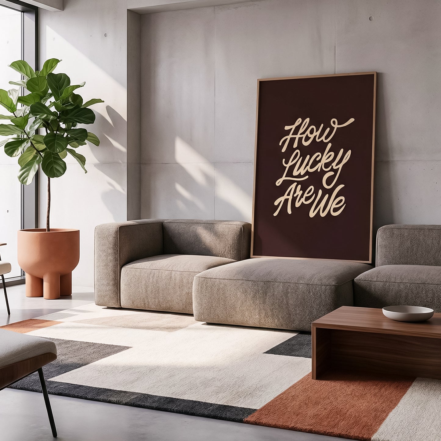 Moody dark neutral digital download print leaning against a wall in a modern aesthetic living room