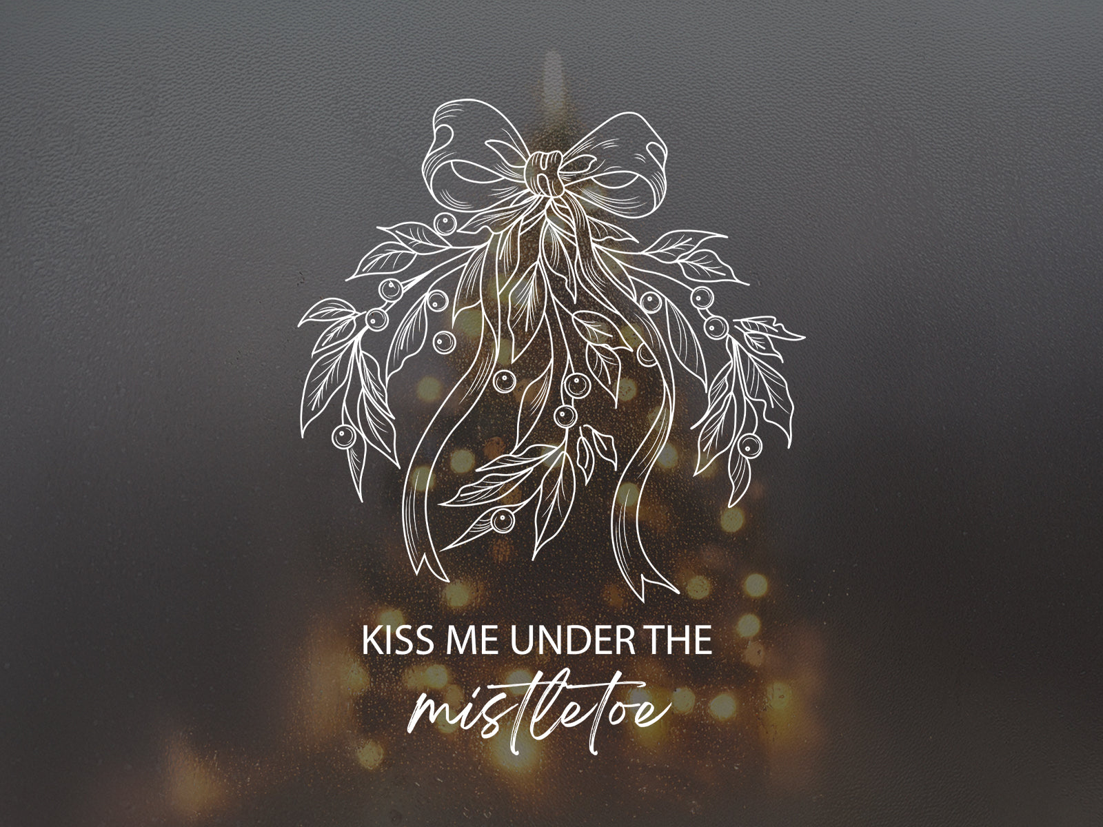 White line art illustration of mistletoe with a bow and text Kiss Me Under The Mistletoe.