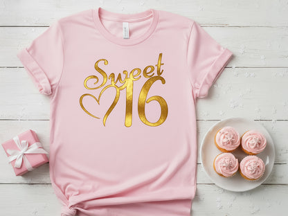 Pink t-shirt featuring a gold glitter "Sweet 16" vinyl design on the chest.