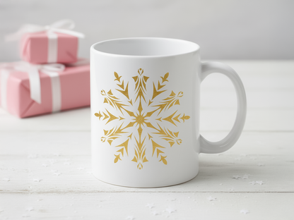 White ceramic mug with a festive gold snowflake print for Christmas